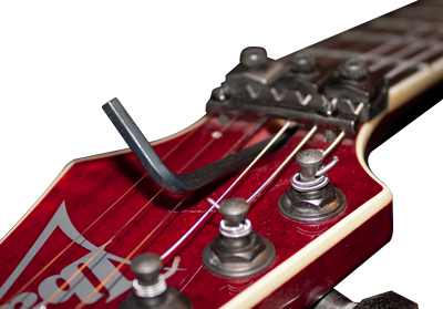 Adjust electric guitar truss rod