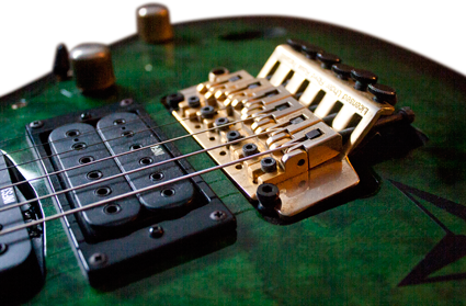 Change strings on a Floyd Rose bridge electric guitar