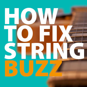 guitar string fret buzz